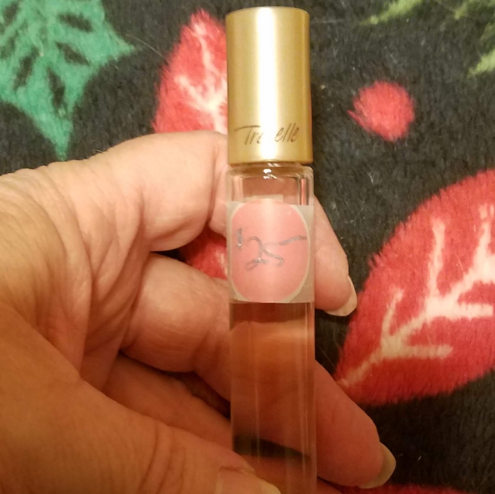 Avon Tresselle Roller ball purfume Please go to my page and see other items th